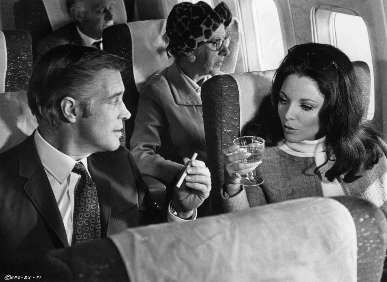 vintage photo of couple on a plane before screen technology